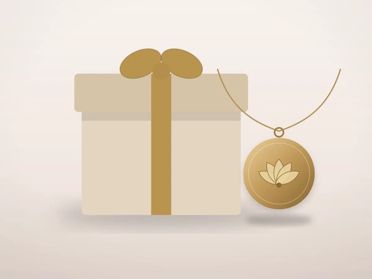 Demo illustration of a gift box with a mala and a pendant